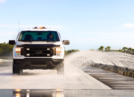 Wet Test Track employs steel, double-high W-Beam guardrails to increase driver and observer safety throughout sector usage.  